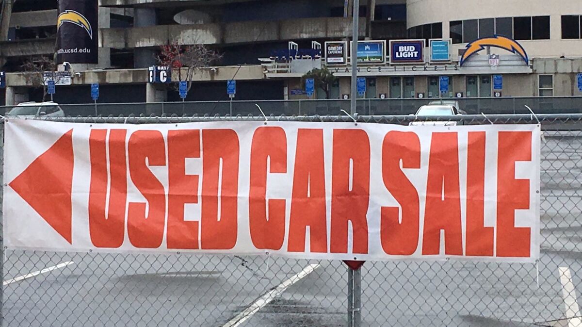 qualcomm used car tent sale